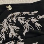 Black luxury abaya with white floral embroidery from Abaya Dubai One modest fashion collection