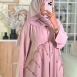 Elegant nude pink abaya with delicate bead embroidery and matching chiffon hijab, perfect for Eid and special occasions.