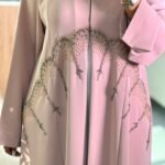 Elegant nude pink abaya with delicate bead embroidery and matching chiffon hijab, perfect for Eid and special occasions.