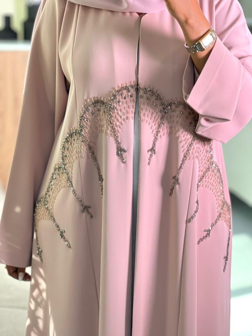 Elegant nude pink abaya with delicate bead embroidery and matching chiffon hijab, perfect for Eid and special occasions.
